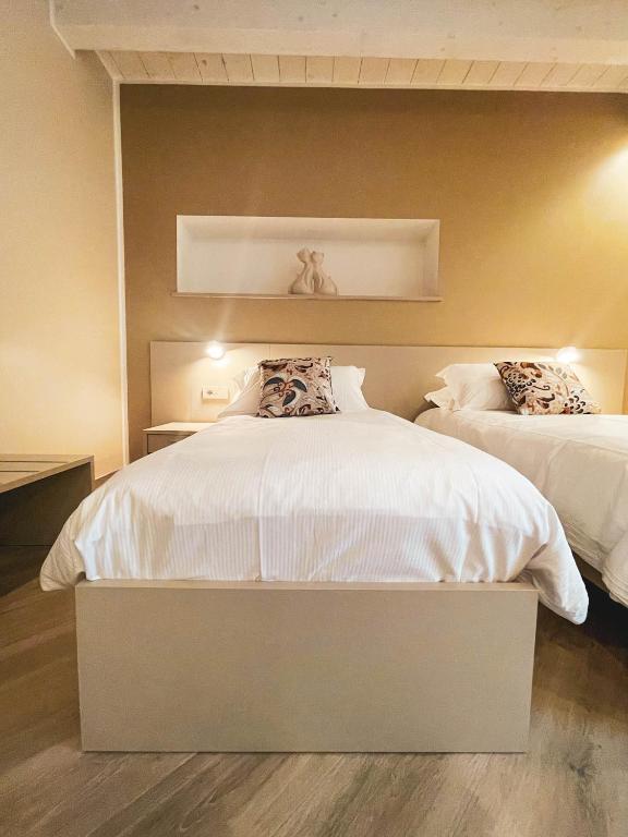 Letto o letti in una camera di GIO' HOUSE