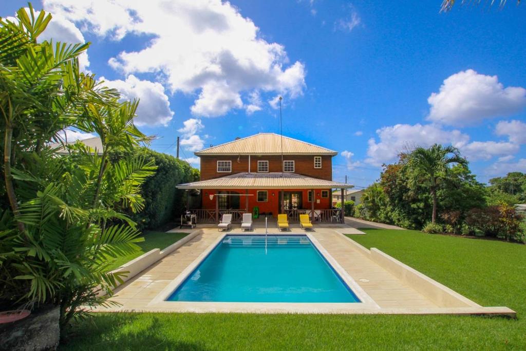 The swimming pool at or close to Five-Bedroom House