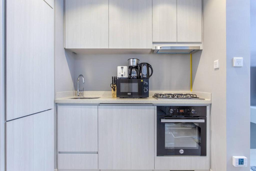 Fotografie z fotogalerie ubytování 1 Br In Zada Tower Business Bay v Dubaji
