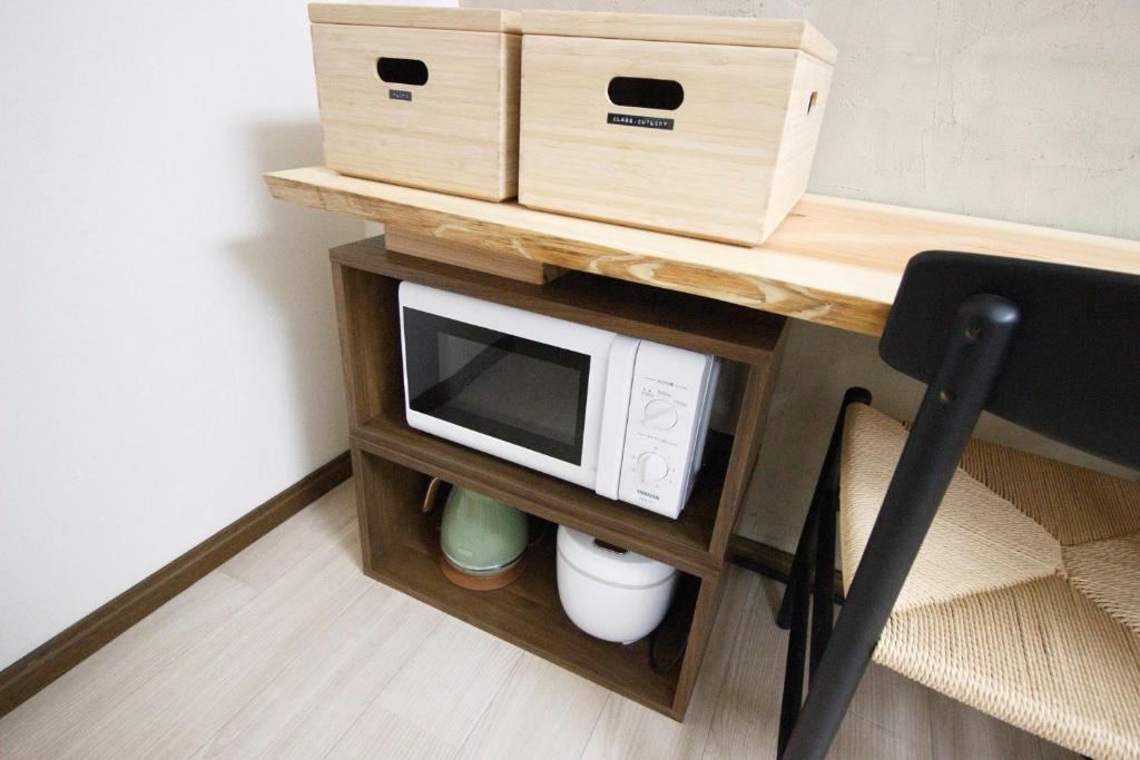 TV a/nebo společenská místnost v ubytování Kaku Studio Apartment Ikebukuro