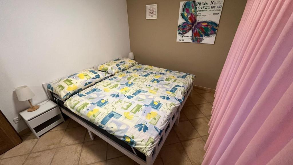 Postel nebo postele na pokoji v ubytování Ferienwohnung Casa Azalea