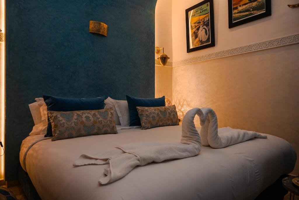 Postel nebo postele na pokoji v ubytování Riad Roummana Marrakech
