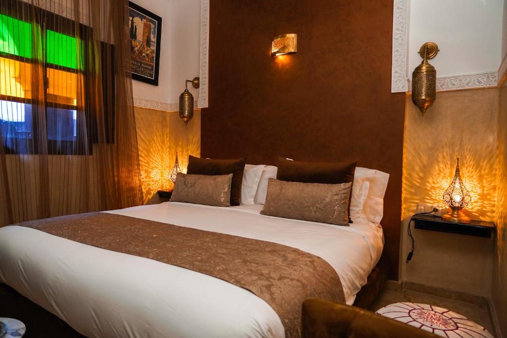 Postel nebo postele na pokoji v ubytování Riad Roummana Marrakech