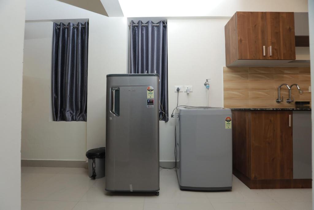 Kuchyň nebo kuchyňský kout v ubytování VVP serviceapartments