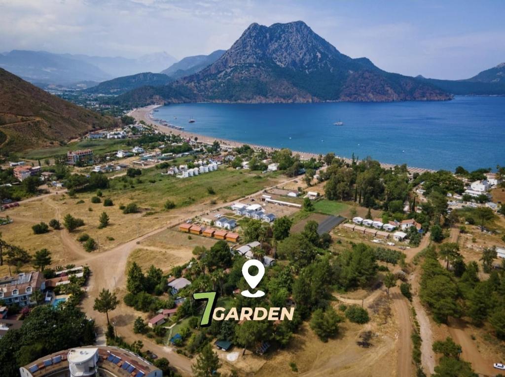an aerial view of a town with a lake and mountains at 7 Garden Bungalow / Camping in Kumluca