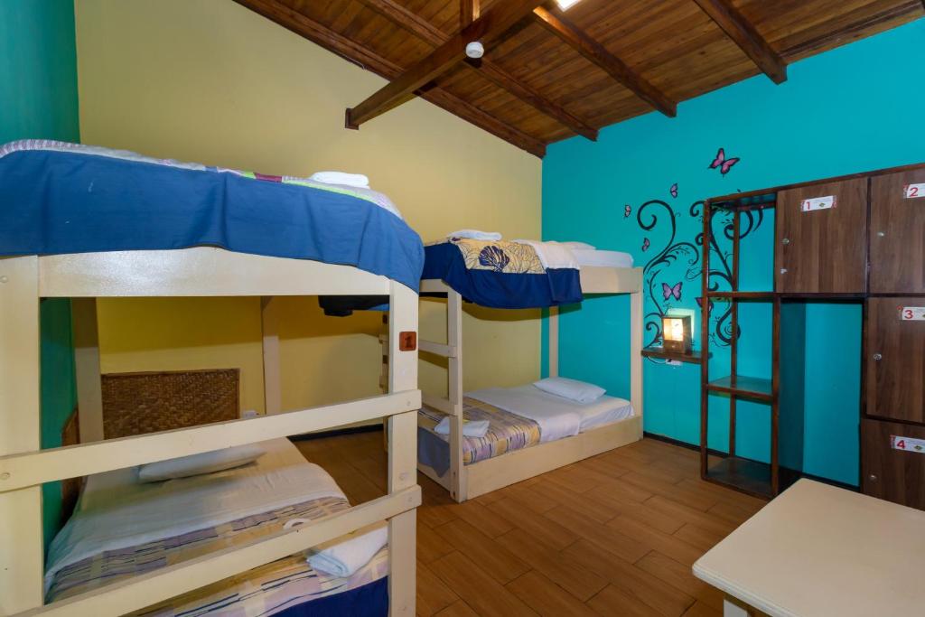 Postel nebo postele na pokoji v ubytování Santa Cruz Backpackers Hostal