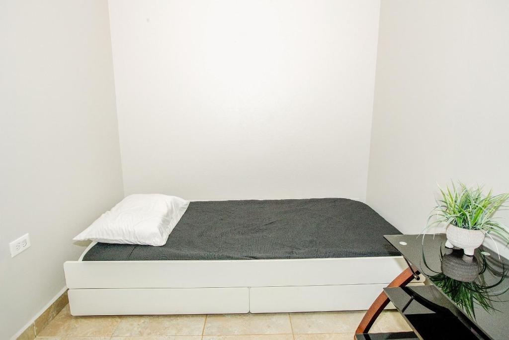 Postel nebo postele na pokoji v ubytování EcoMar Rentals