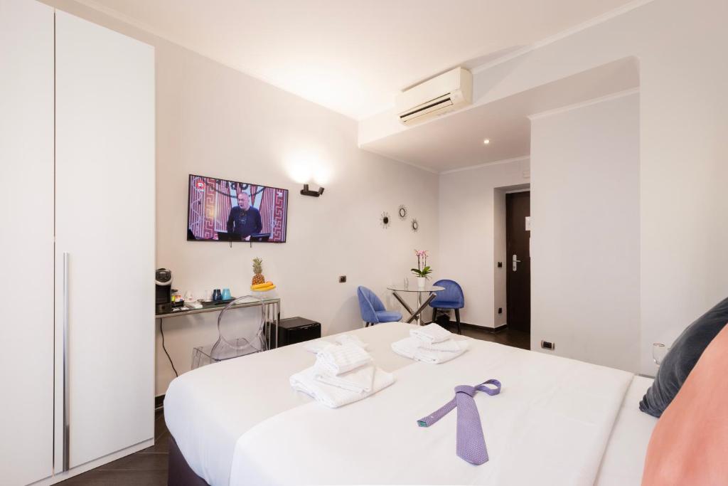 Postel nebo postele na pokoji v ubytování Cloud 9 Hotel