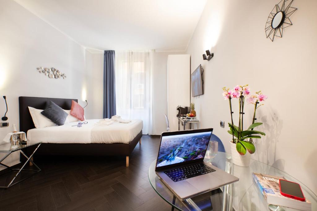 Postel nebo postele na pokoji v ubytování Cloud 9 Hotel