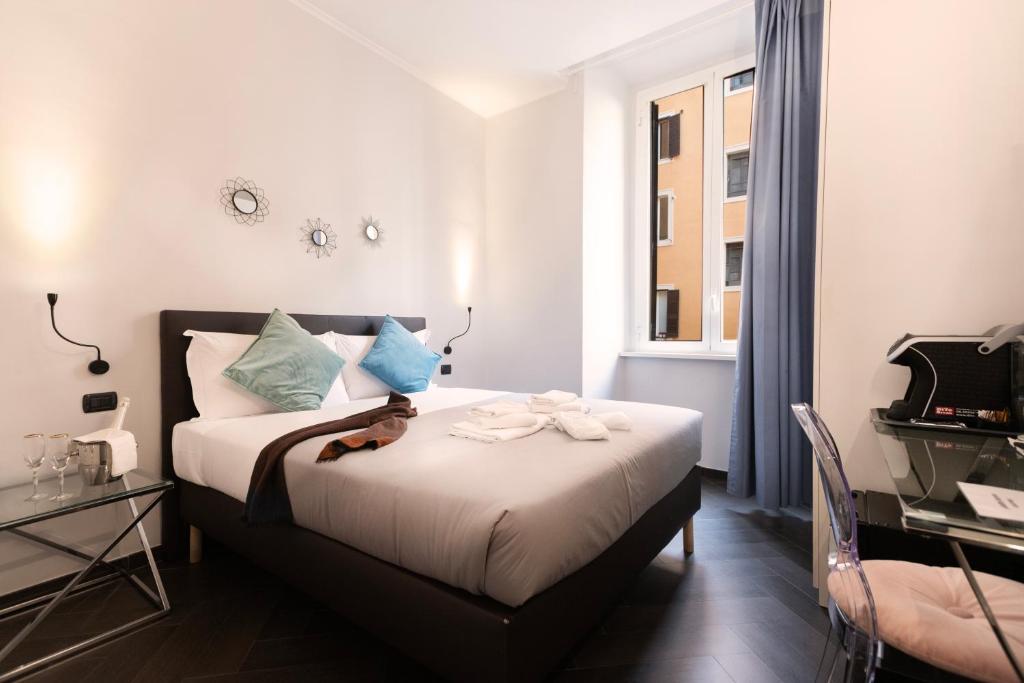 Postel nebo postele na pokoji v ubytování Cloud 9 Hotel