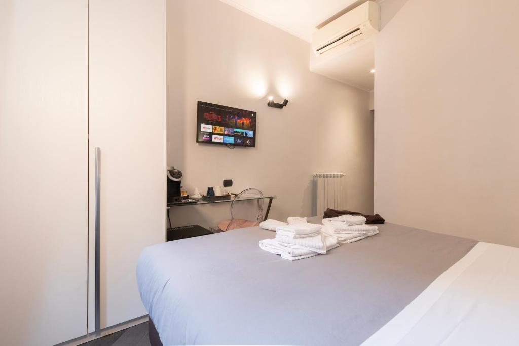Postel nebo postele na pokoji v ubytování Cloud 9 Hotel