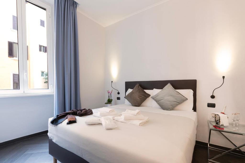 Postel nebo postele na pokoji v ubytování Cloud 9 Hotel