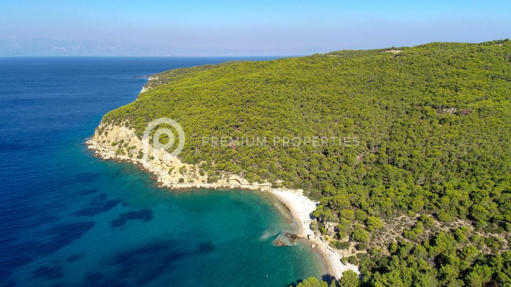 an aerial view of an island in the ocean at Villa Tranquility - Walk to the Beach with Infinity Pool in Porto Heli