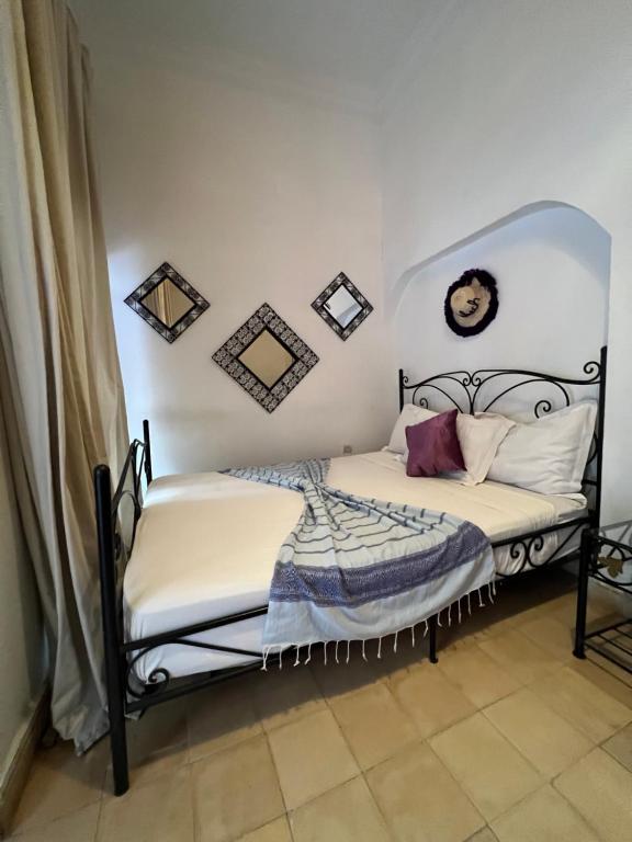 Postel nebo postele na pokoji v ubytování Riad Ago