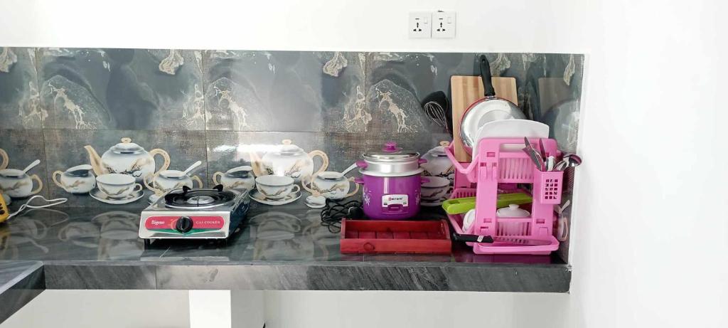 Příslušenství pro přípravu čaje a kávy v ubytování Quiet Place villa with kitchen