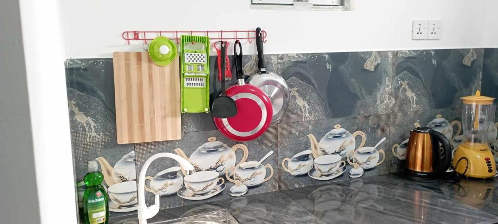 Příslušenství pro přípravu čaje a kávy v ubytování Quiet Place villa with kitchen
