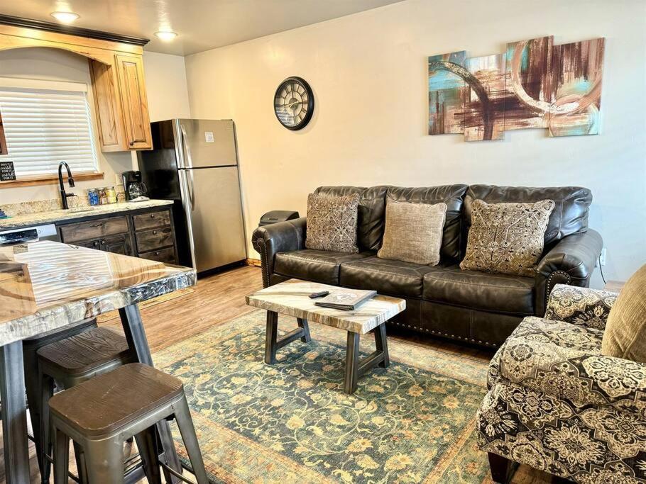 a living room with a couch and a table at Angel Rock Rentals of Moab Unit 4 in Moab