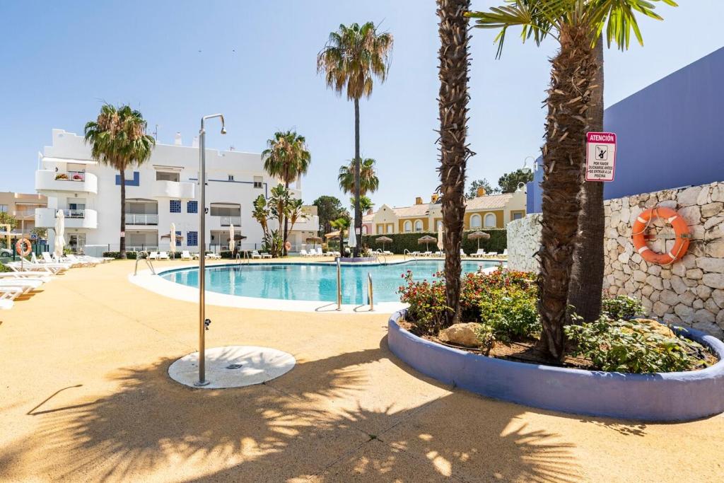 Bazén v ubytování Casa Islantilla Real nebo v jeho okolí