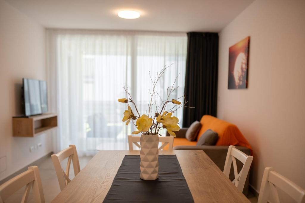 Televízia a/alebo spoločenská miestnosť v ubytovaní A&V Residence