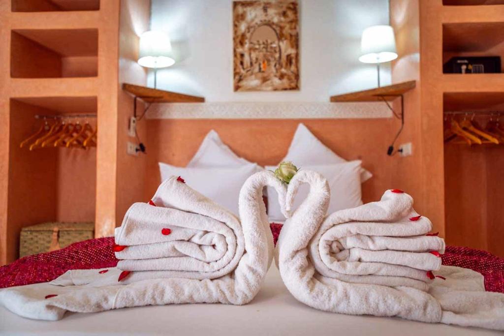 Postel nebo postele na pokoji v ubytování Riad Ambre et Jasmin