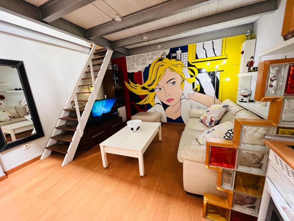 a room with a living room with a cartoon at Palafox in Madrid