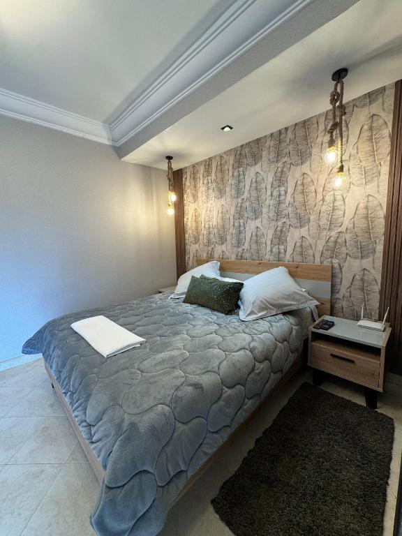 Een bed of bedden in een kamer bij Studio Plage Malabata tanger