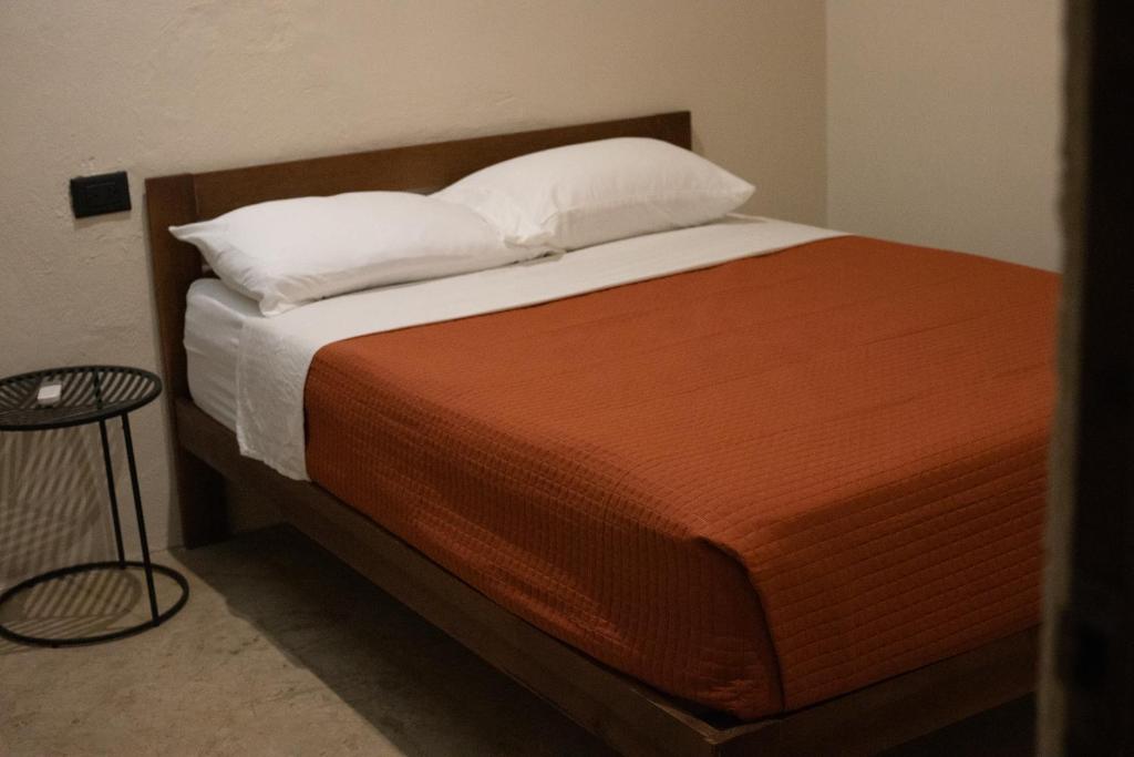 Una cama o camas en una habitación de Xùva
