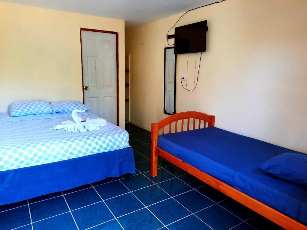 Postel nebo postele na pokoji v ubytování Habitación Privada - Apartamentos Morpho CR