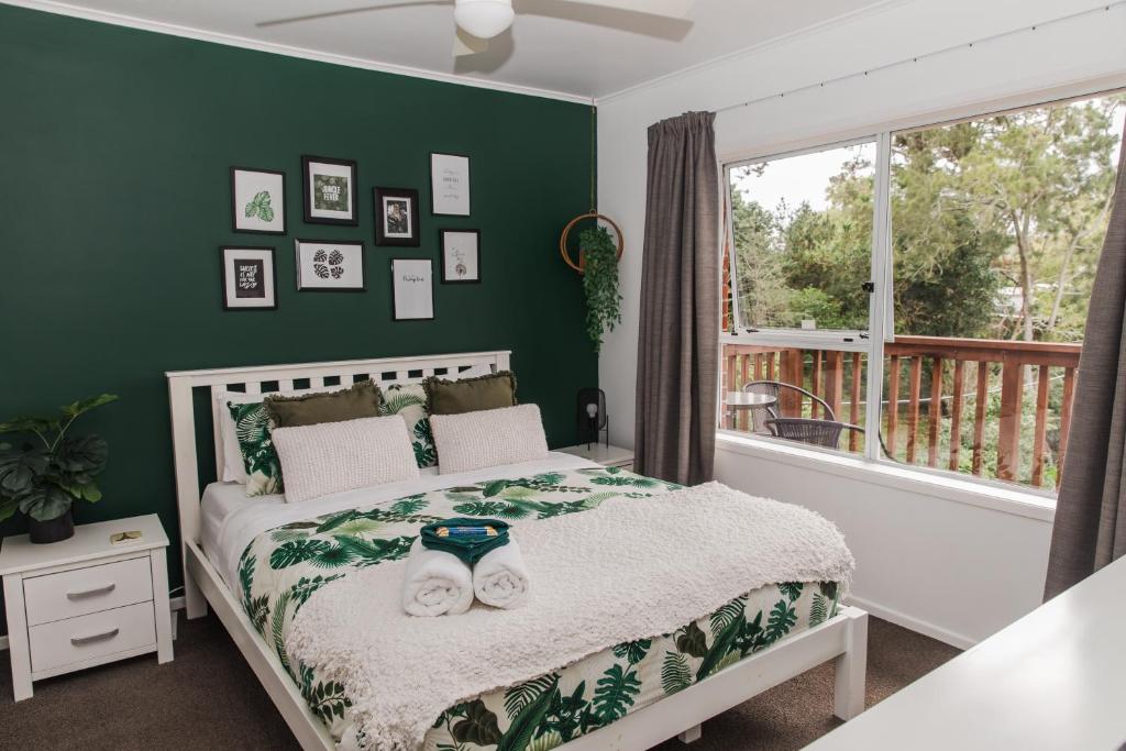 Katil atau katil-katil dalam bilik di Home away from Home - Jungle style