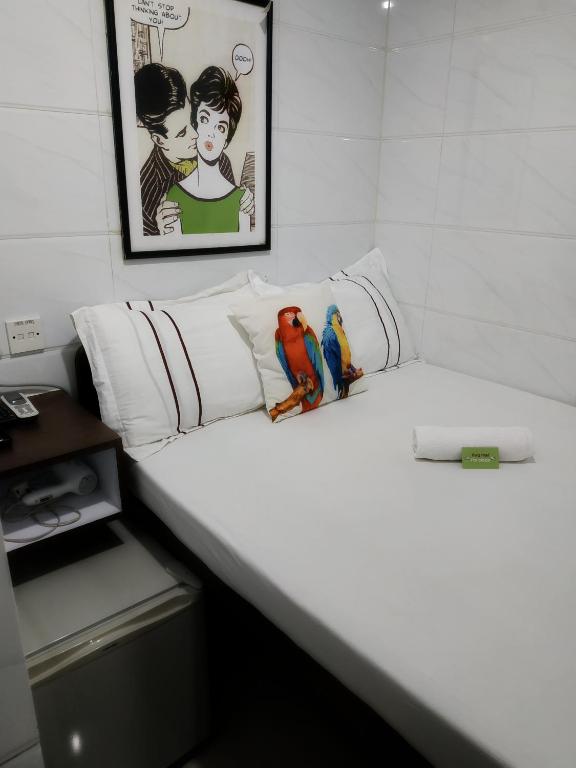 Voodi või voodid majutusasutuse Sun Guest House toas