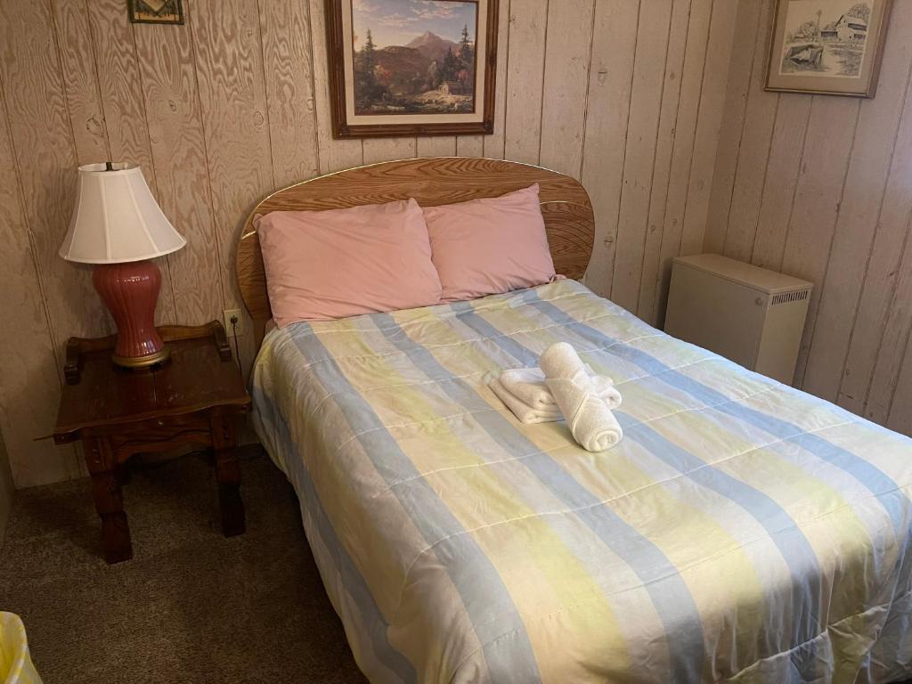 Una cama o camas en una habitación de El susurro de las mariposas
