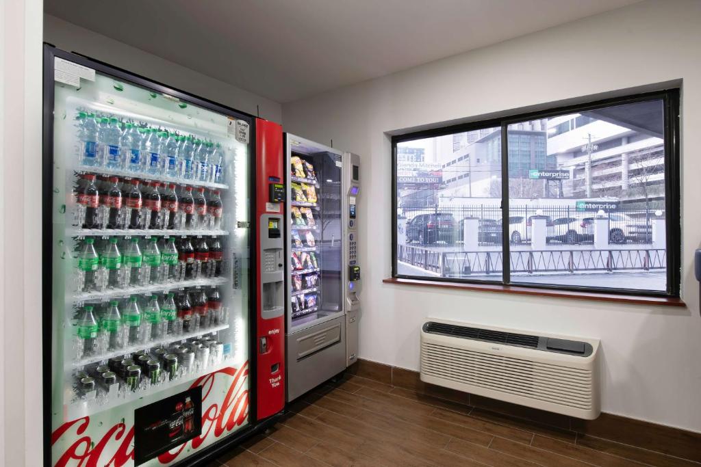 a soda machine in a store with a window at Motel 6-Atlanta, GA - Downtown in Atlanta