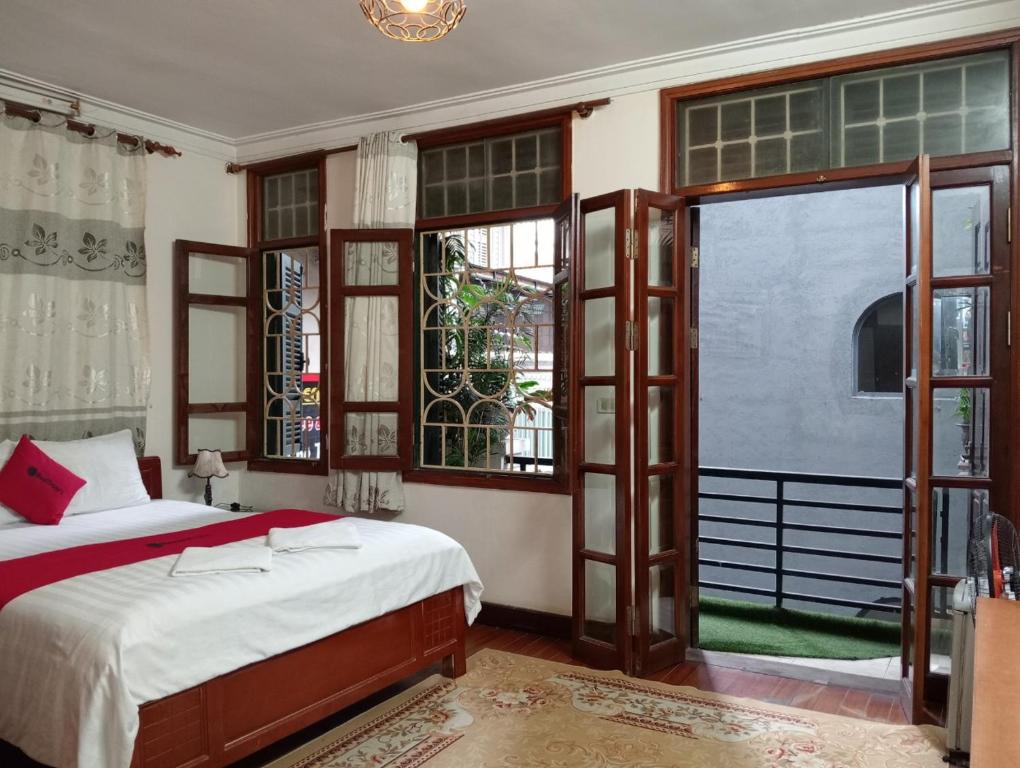 Postel nebo postele na pokoji v ubytování Sophie hotel