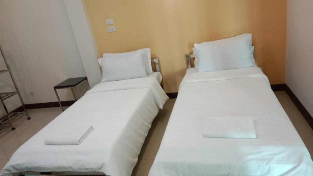 Postel nebo postele na pokoji v ubytování DD Residence Sai5 Salaya ห้องพัก ดีดี สาย5 ศาลายา