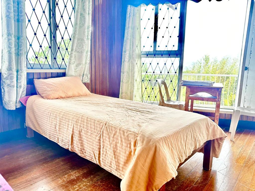 Postel nebo postele na pokoji v ubytování Baguio BELL Staycation