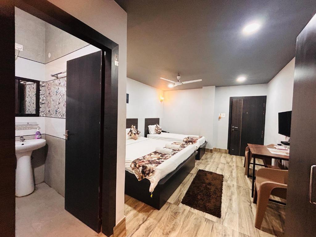 JD Grand Inn - Luxe Drievoudige Kamer
