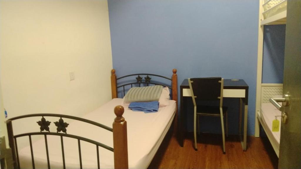 Postel nebo postele na pokoji v ubytování Moon Eleven Hostel Near Klia & Klia2
