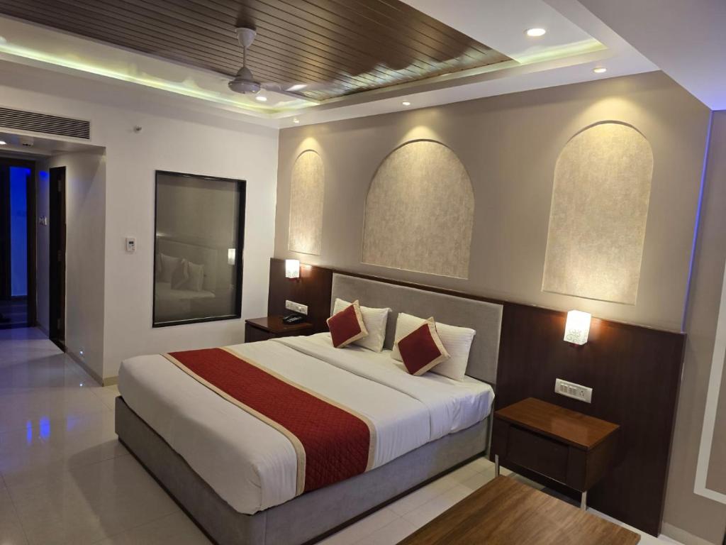 Postel nebo postele na pokoji v ubytování KAMAT'S DAFFODIL RESORT GOA