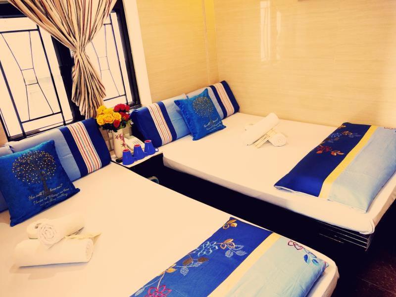 Rúm í herbergi á Paris Guest House (D2, 10/F)