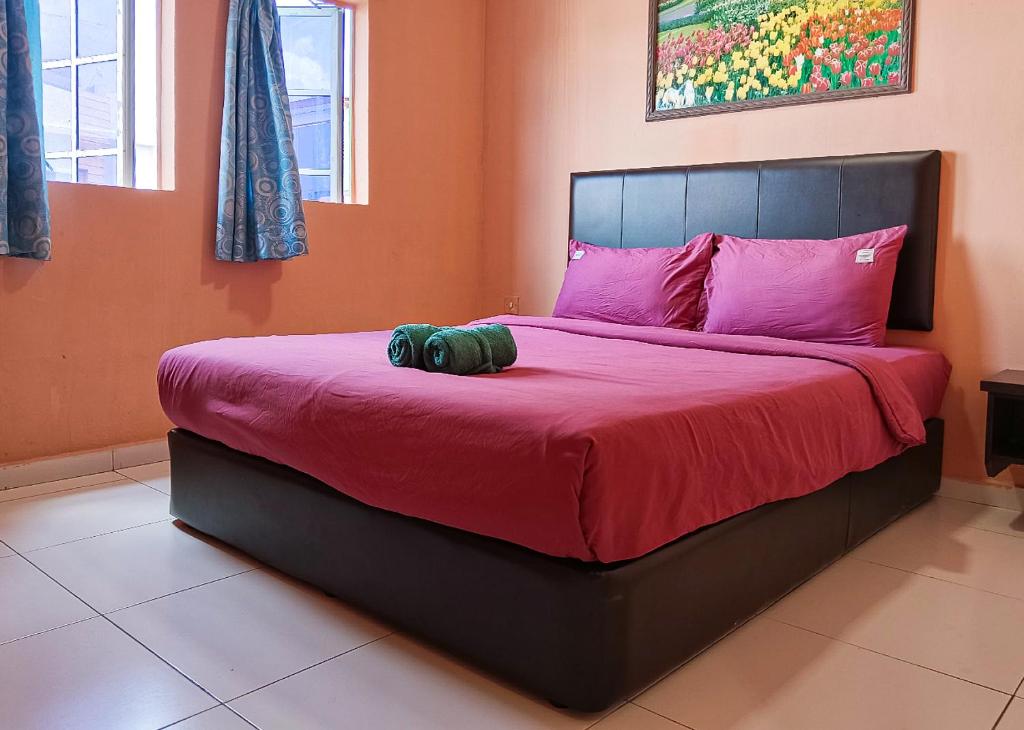Postel nebo postele na pokoji v ubytování Hotel EC Double Star KLIA 1-KLIA 2