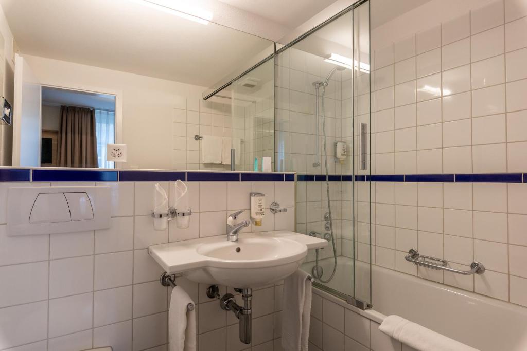 Vannituba majutusasutuses Hotel Kronenhof