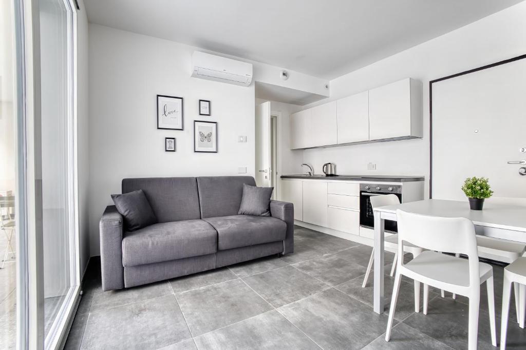 Just Urban Stays - Modern 1BR Apt with Terrace - 10 min M4 to Duomo