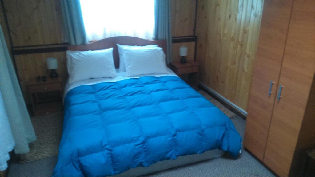Postel nebo postele na pokoji v ubytování Hospedaje Ayelen