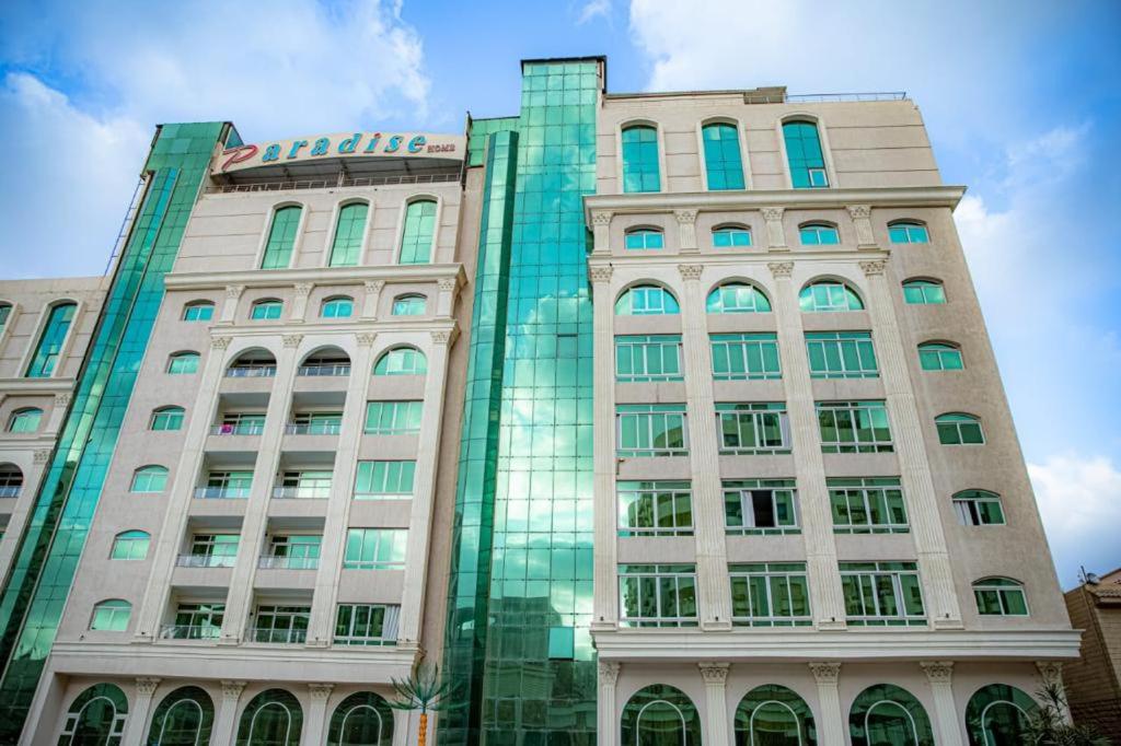 a large building with glass windows on the side of it at paradise city stars in Cairo