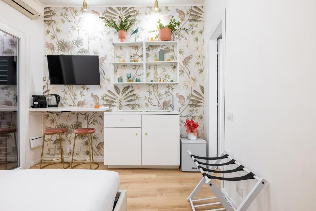 Η κουζίνα ή μικρή κουζίνα στο Leonina Apt - Colosseum