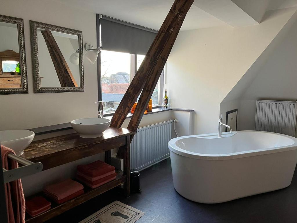 Et badeværelse på B&B Het Oude Dorpscafé