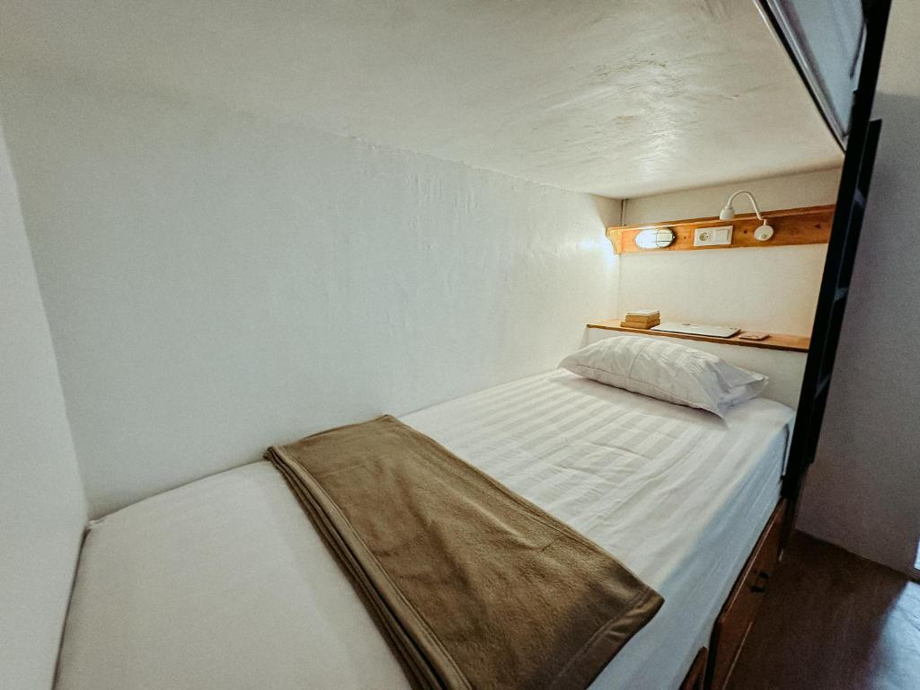Postel nebo postele na pokoji v ubytování De Nata