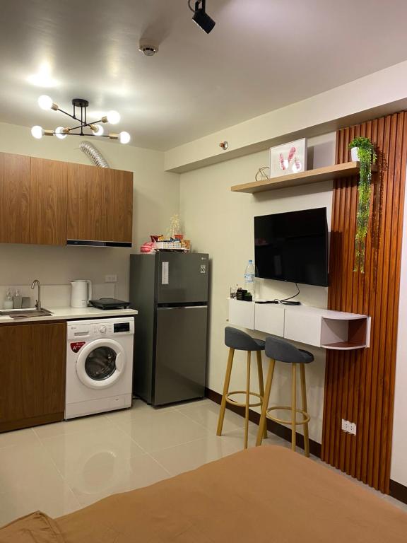 Kuchyň nebo kuchyňský kout v ubytování RichAirbnb Cebu