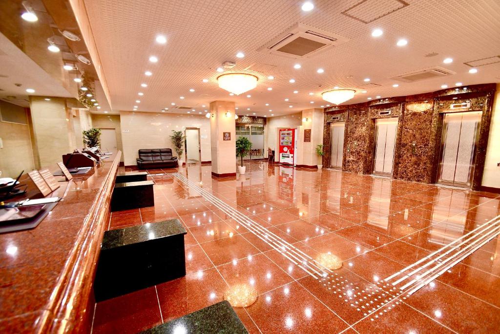 Posezení v ubytování Himeji Ekimae Universal Hotel Minamiguchi