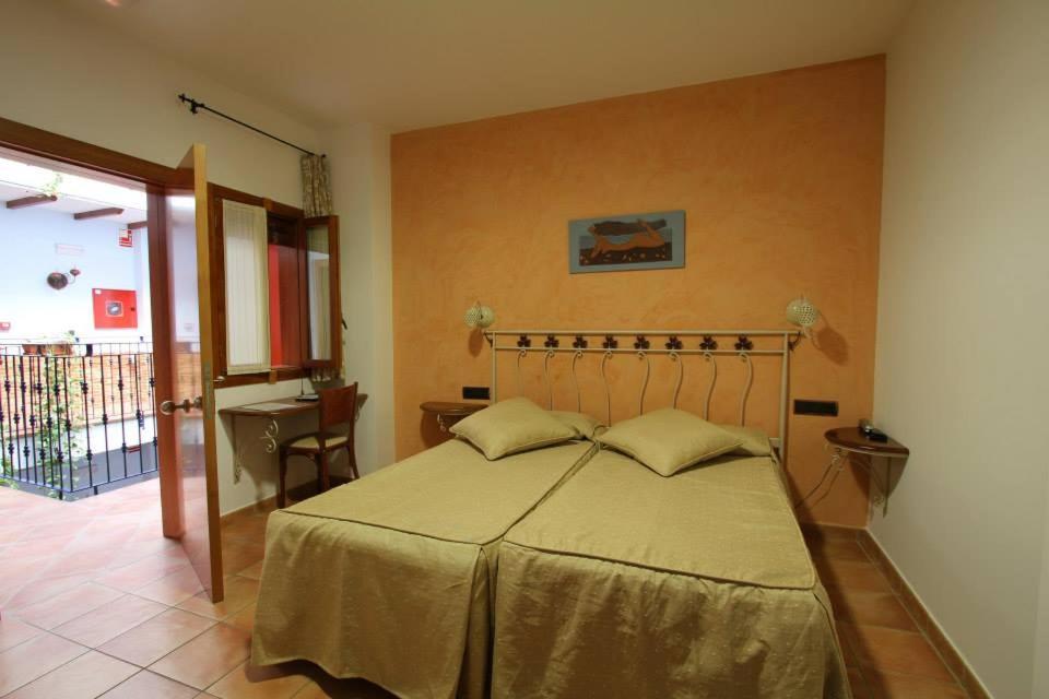 Cama o camas de una habitación en La Galerica